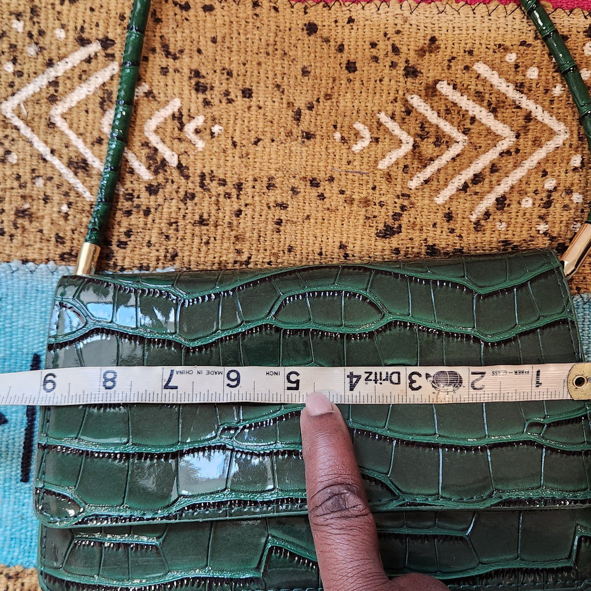 Tape measure across the front of the bag showing the width