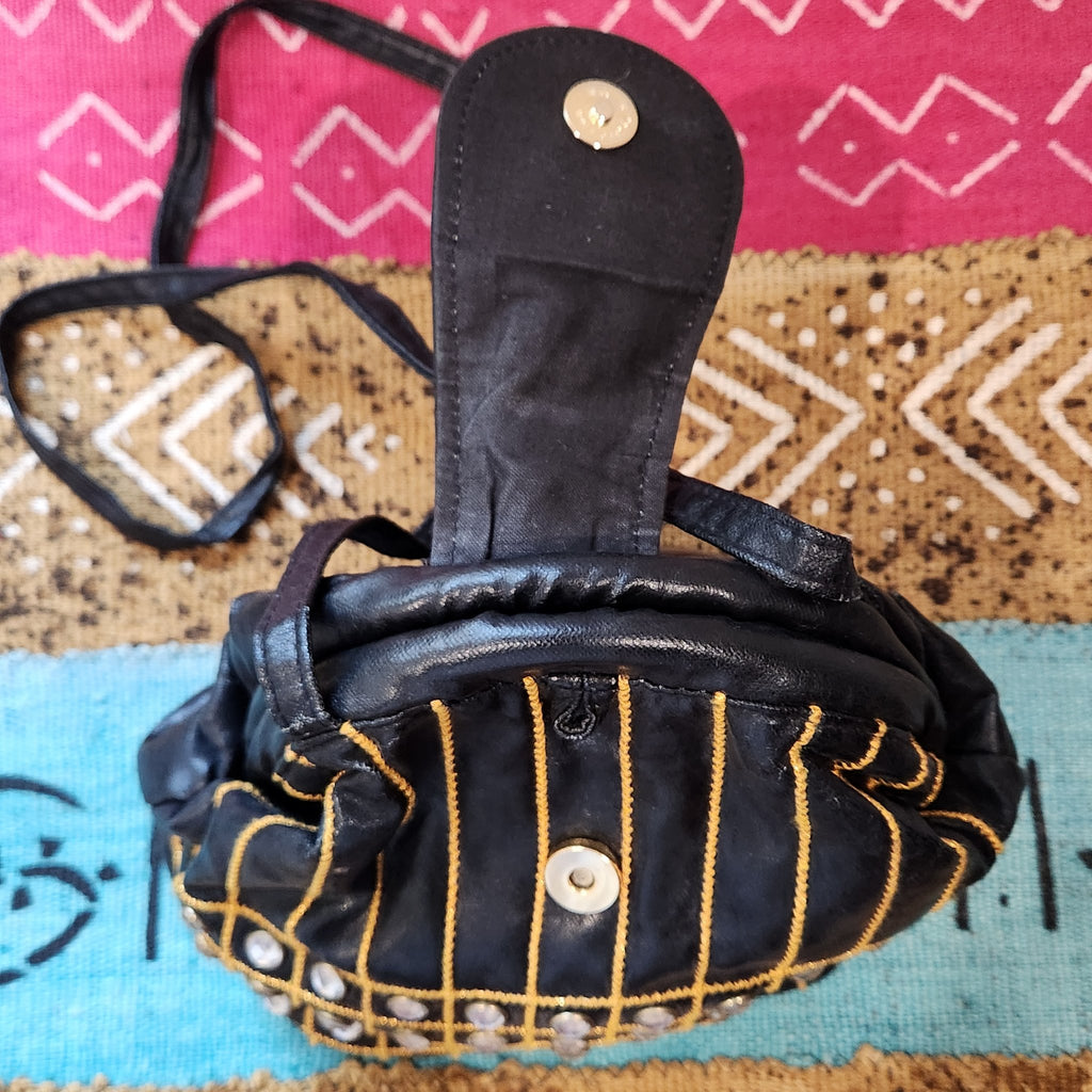 Original photo: bag with flap open showing the magnetic snap closure and gathered top