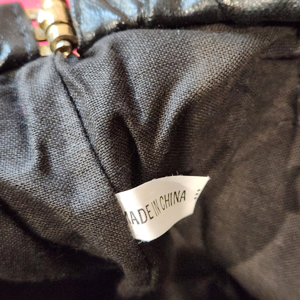 Original photo: close-up of the interior tag reading MADE IN CHINA