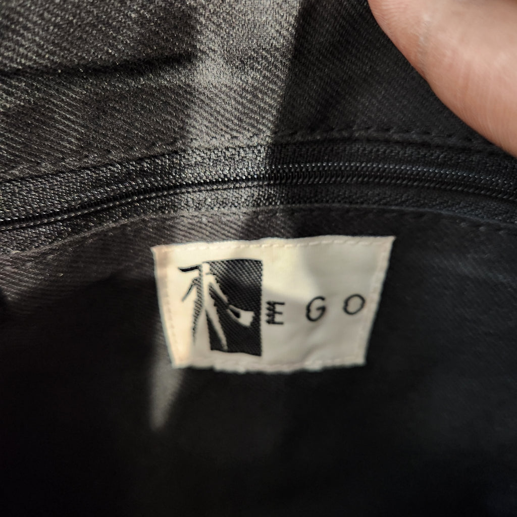 Original photo: interior EGO brand label inside the vintage black suede fringe bag