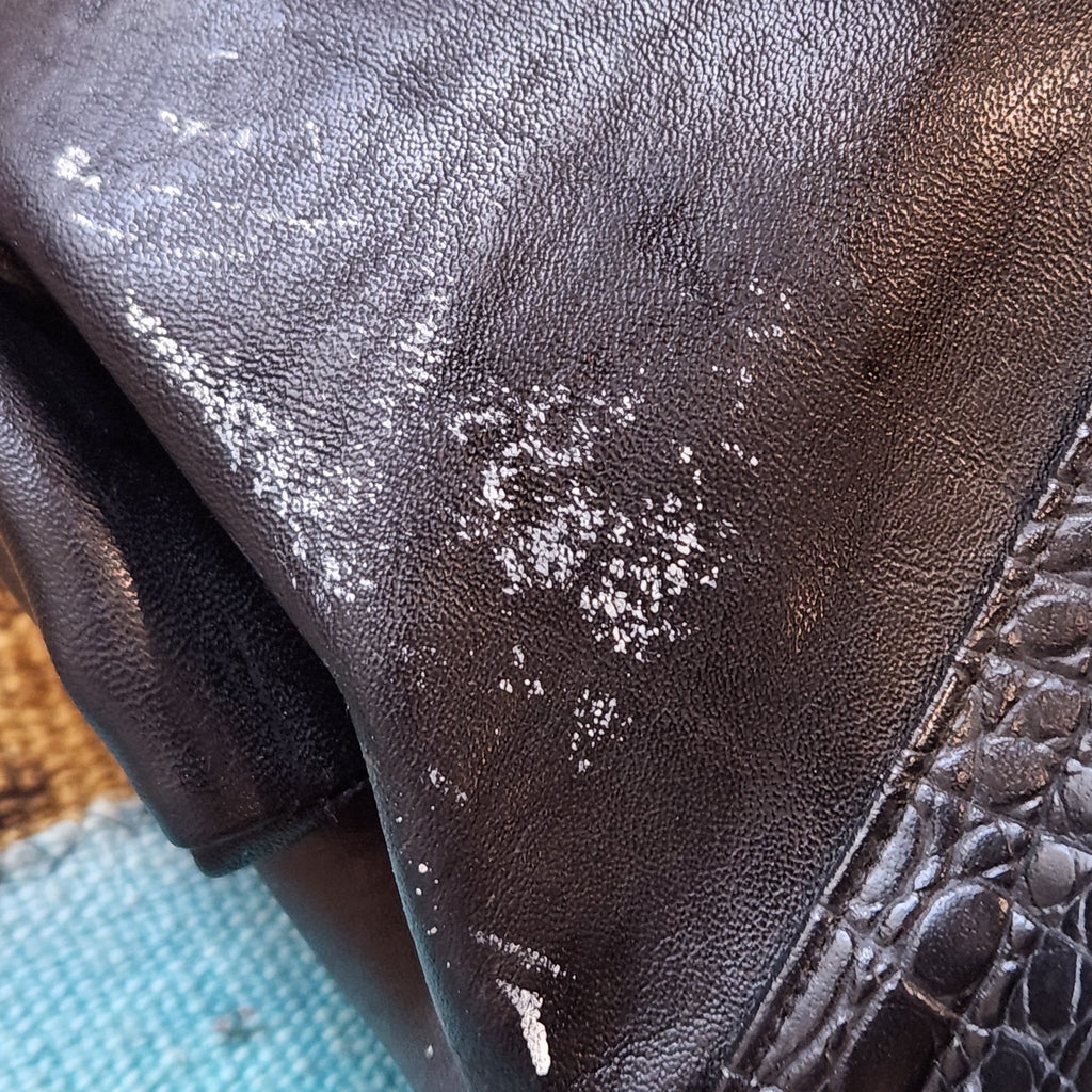 LaTique handbag close-up of visible surface wear