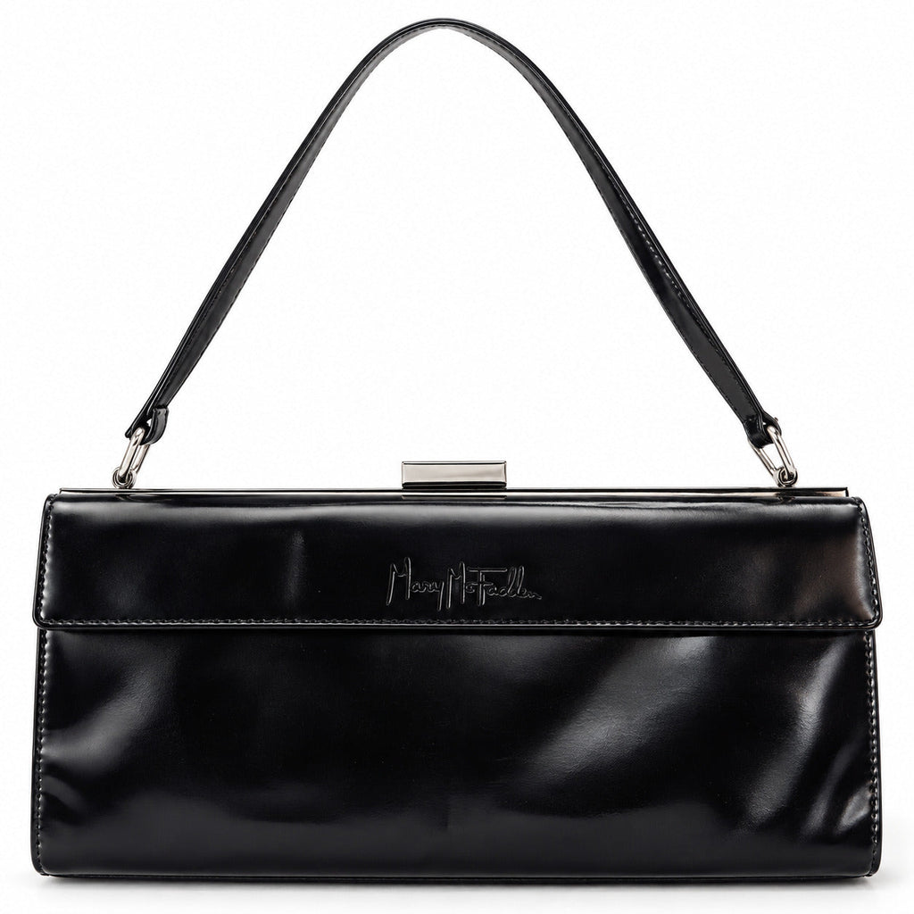 Mary McFadden vintage 3-in-1 handbag, solid black panel on white, editorial-enhanced image