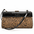 Mary McFadden vintage 3-in-1 handbag, leopard-print panel on white, editorial-enhanced image