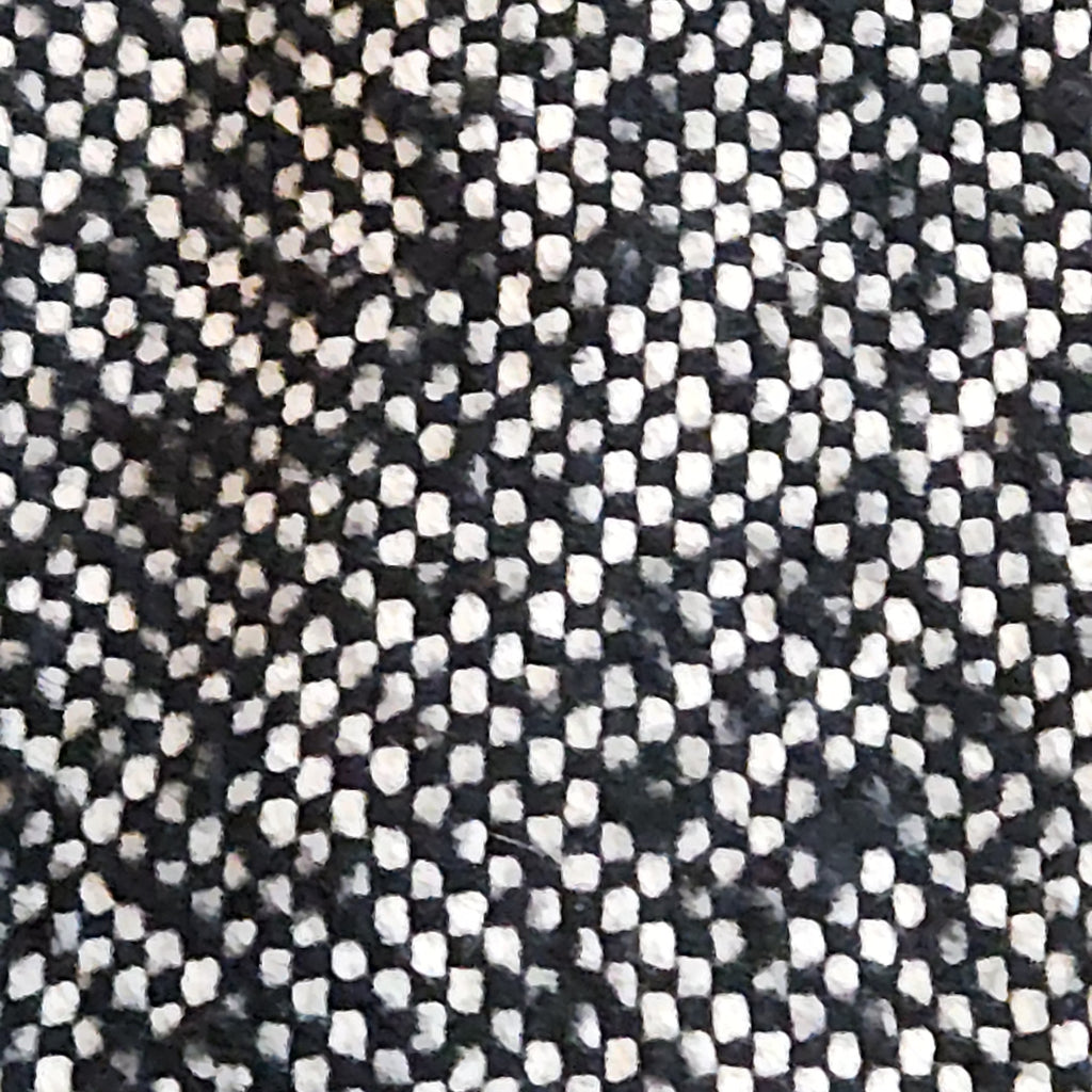 Lucille Golden Vintage, LLC black and white textured tweed fabric close-up for MICHAEL Michael Kors sleeveless dress