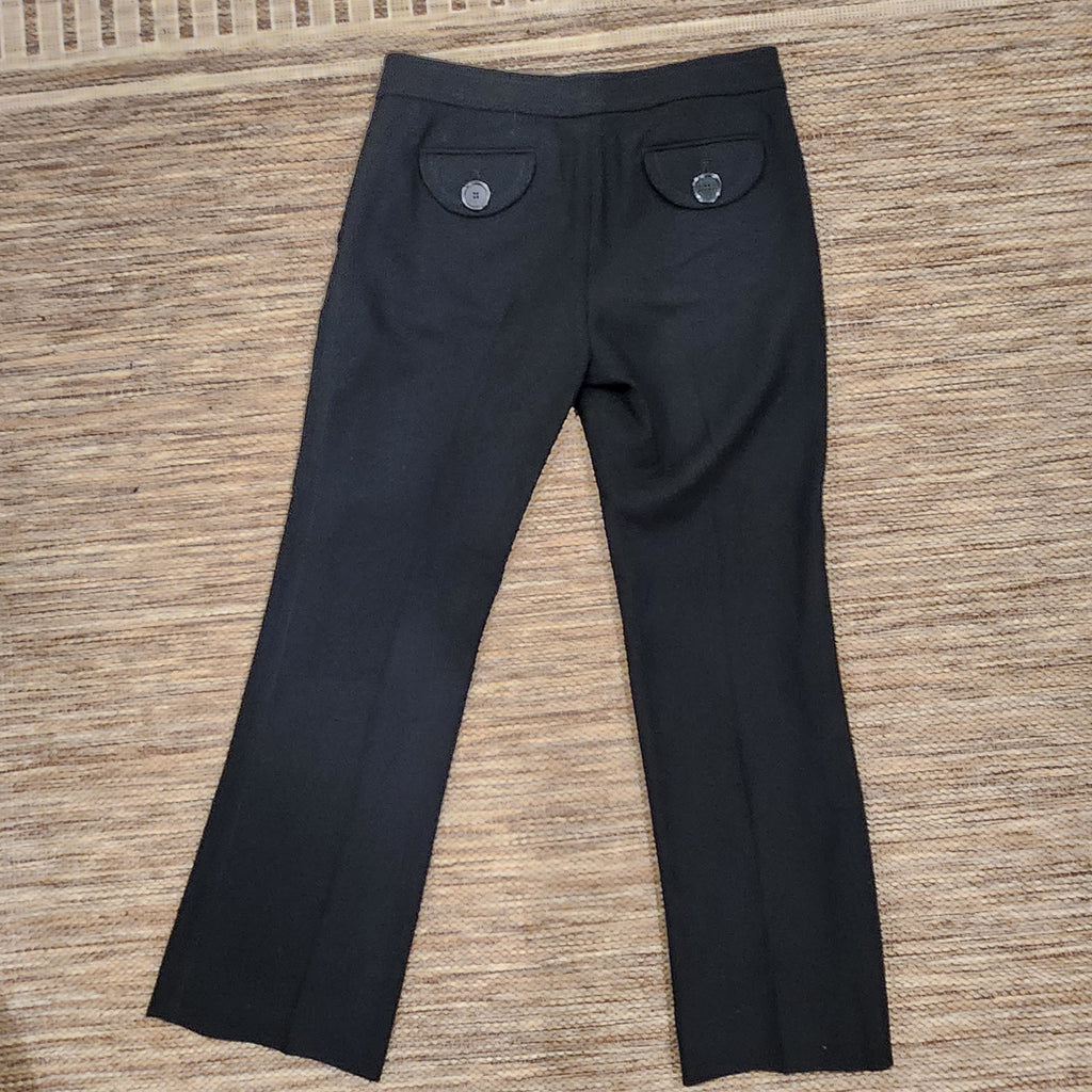 Lucille Golden Vintage, LLC black Marc Jacobs wool dress trousers featuring back button-flap pockets.