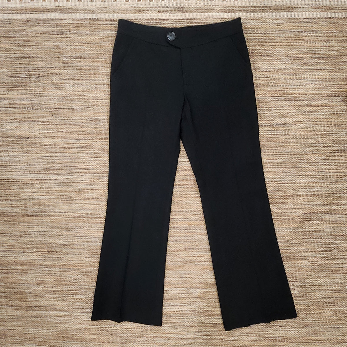 Lucille Golden Vintage, LLC Marc Jacobs black wool dress trousers with a tailored fit and front button closure.