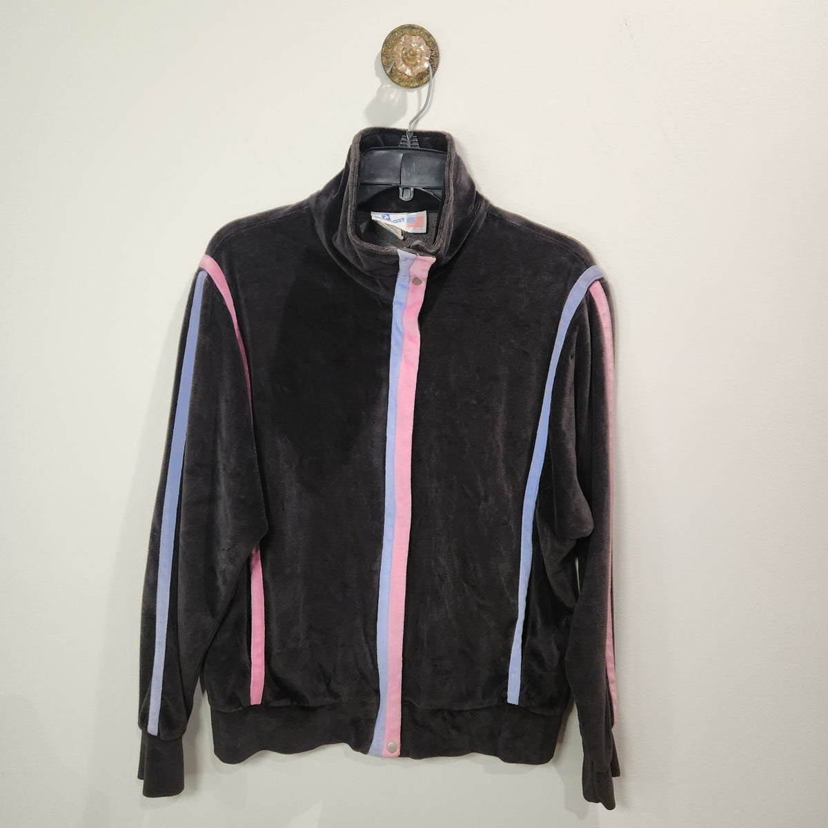 Lucille Golden Vintage, LLC dark brown velour track jacket with pastel pink and light blue racing stripes.