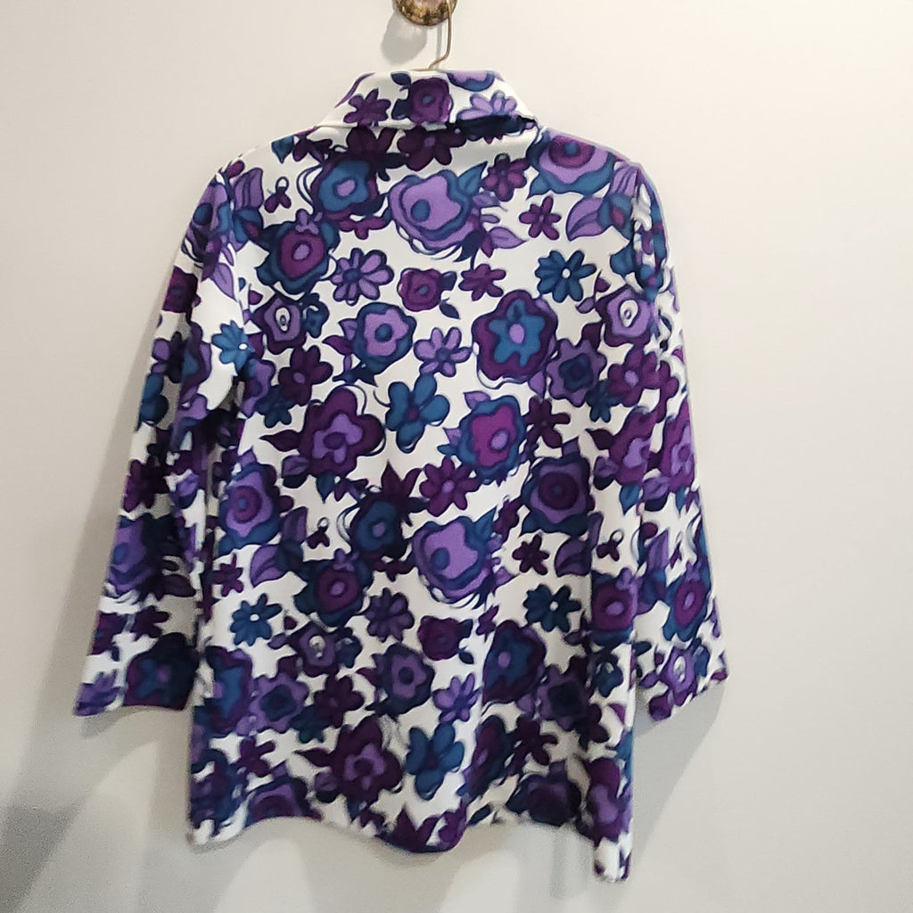 Lucille Golden Vintage, LLC long-sleeve button-down shirt with a vibrant purple, violet, and teal floral print.