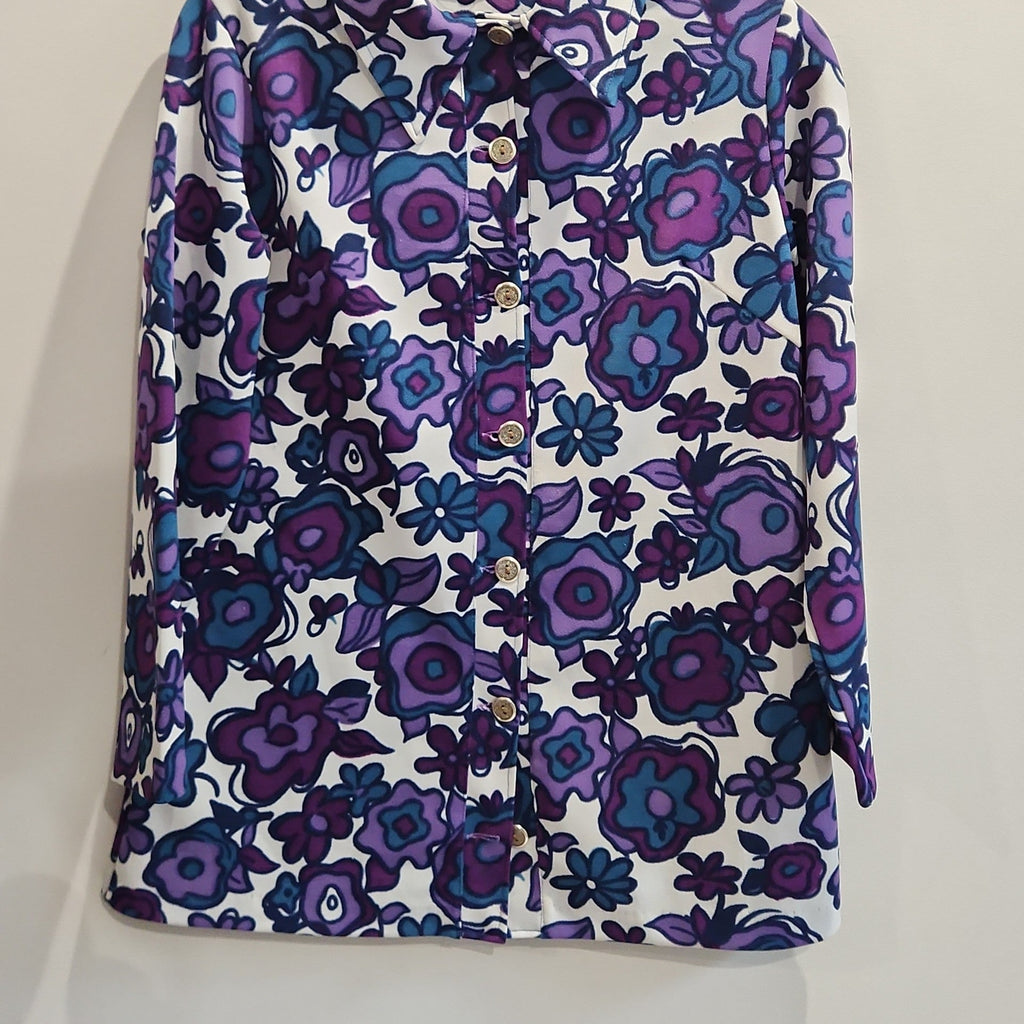 Lucille Golden Vintage, LLC long-sleeve button-down shirt with a vibrant purple, violet, and teal floral print.