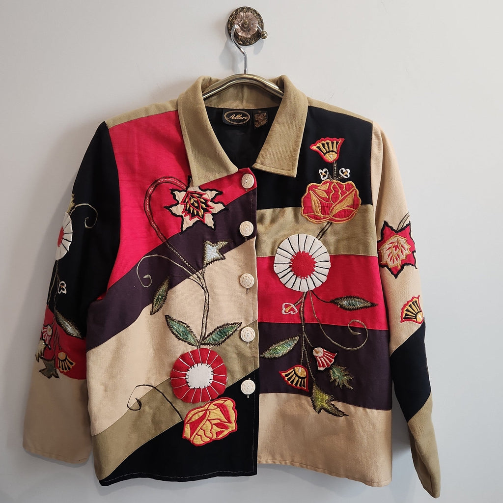 Lucille Golden Vintage, LLC patchwork button-up jacket featuring tan, black, and red colour-blocking with floral embroidery