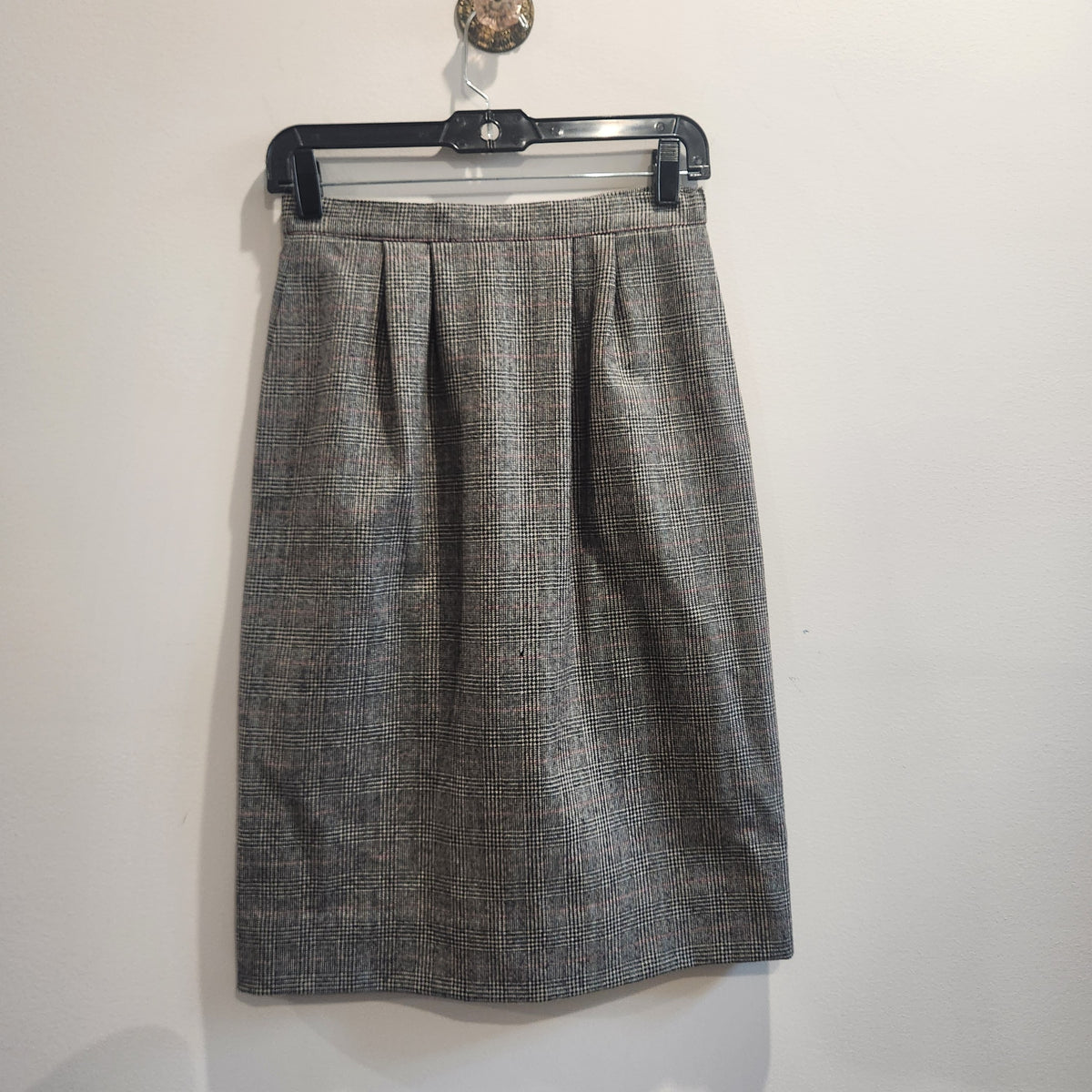Lucille Golden Vintage, LLC high-waisted grey glen plaid wool skirt with elegant waist pleating and professional cut.