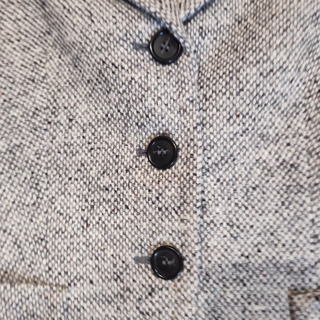 Lucille Golden Vintage, LLC Max Mara grey and black salt-and-pepper wool-blend blazer with three-button front closure.