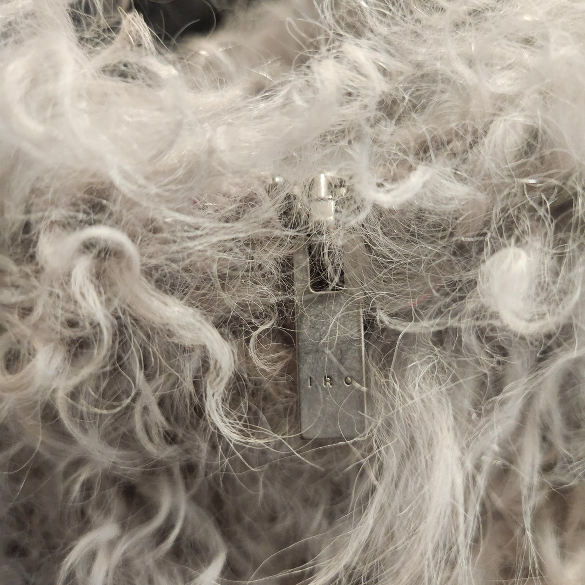 Lucille Golden Vintage, LLC IRO lamb fur jacket featuring a detailed view of the branded silver metal zipper pull