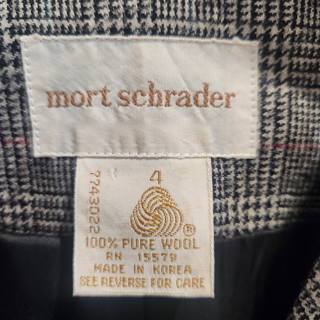 Lucille Golden Vintage, LLC mort schrader vintage wool skirt suit label showing 100% pure wool and size 4