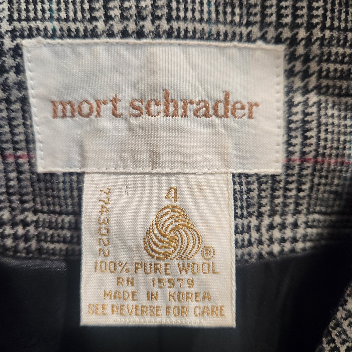 Lucille Golden Vintage, LLC mort schrader vintage wool skirt suit label showing 100% pure wool and size 4