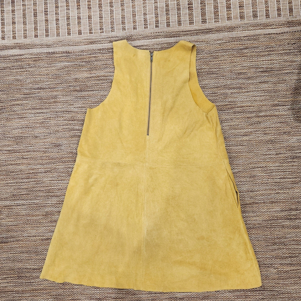 Lucille Golden Vintage, LLC mustard yellow suede mini dress with a front zipper and sleeveless design.