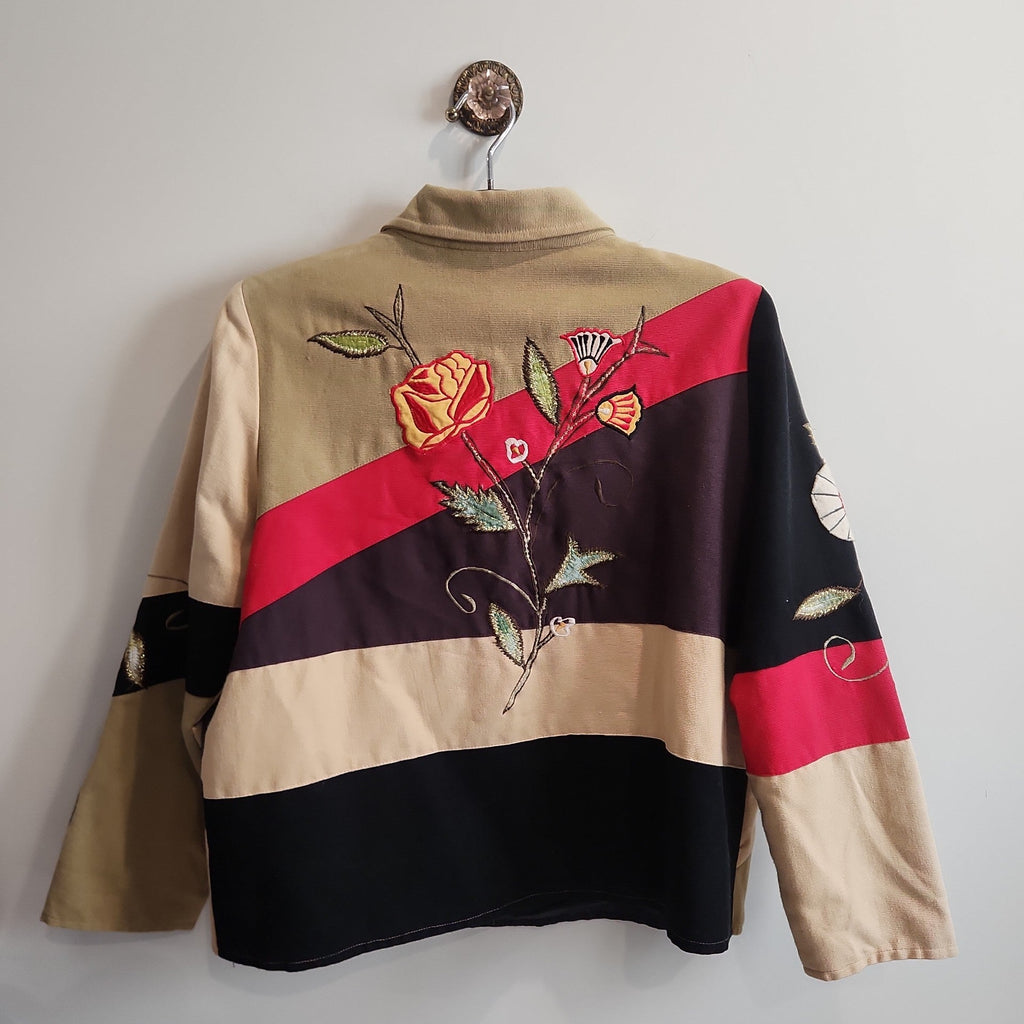 Lucille Golden Vintage, LLC patchwork jacket in tan, black, and red with floral embroidery and button-up front.
