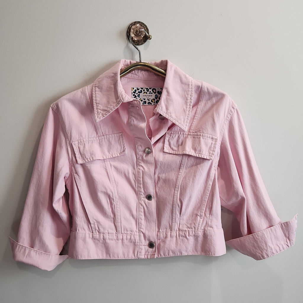 Lucille Golden Vintage, LLC pastel pink cropped denim jacket with button-front, chest pockets, and leopard print label