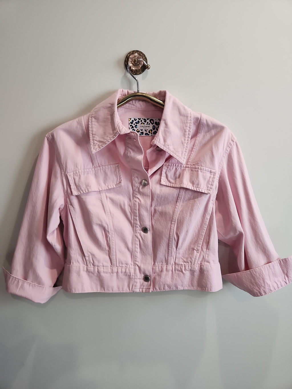 Lucille Golden Vintage, LLC pastel pink cropped denim jacket with button front and leopard print neck label