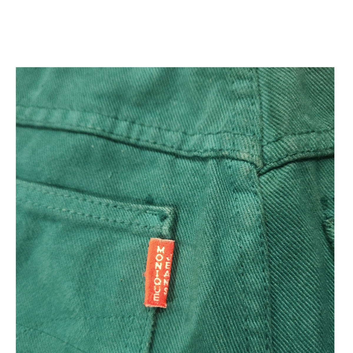 Lucille Golden Vintage, LLC teal cotton denim shorts featuring a signature red Monique Jeans brand tab on the pocket