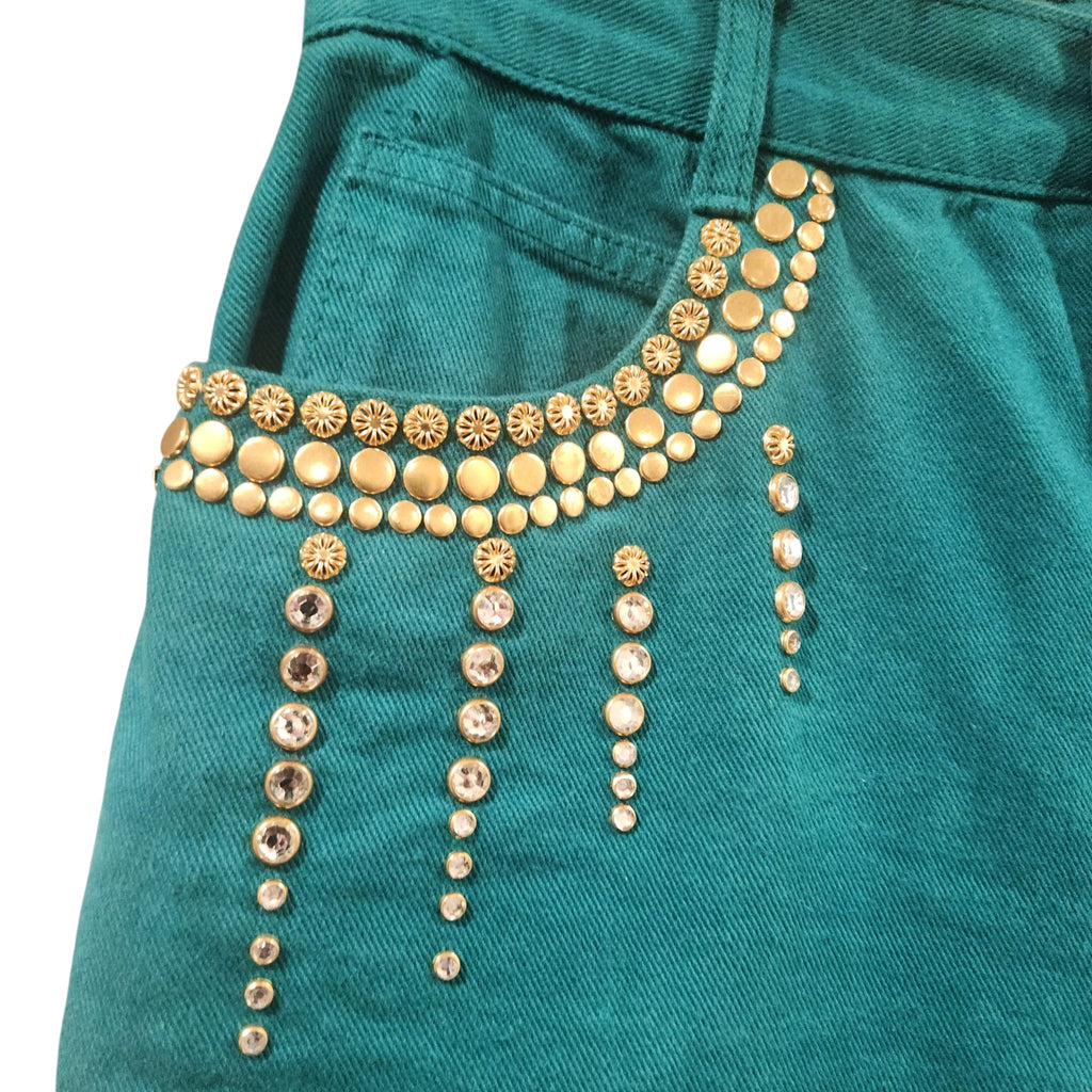 Lucille Golden Vintage, LLC teal cotton denim shorts featuring gold stud and rhinestone embellishments on the pocket