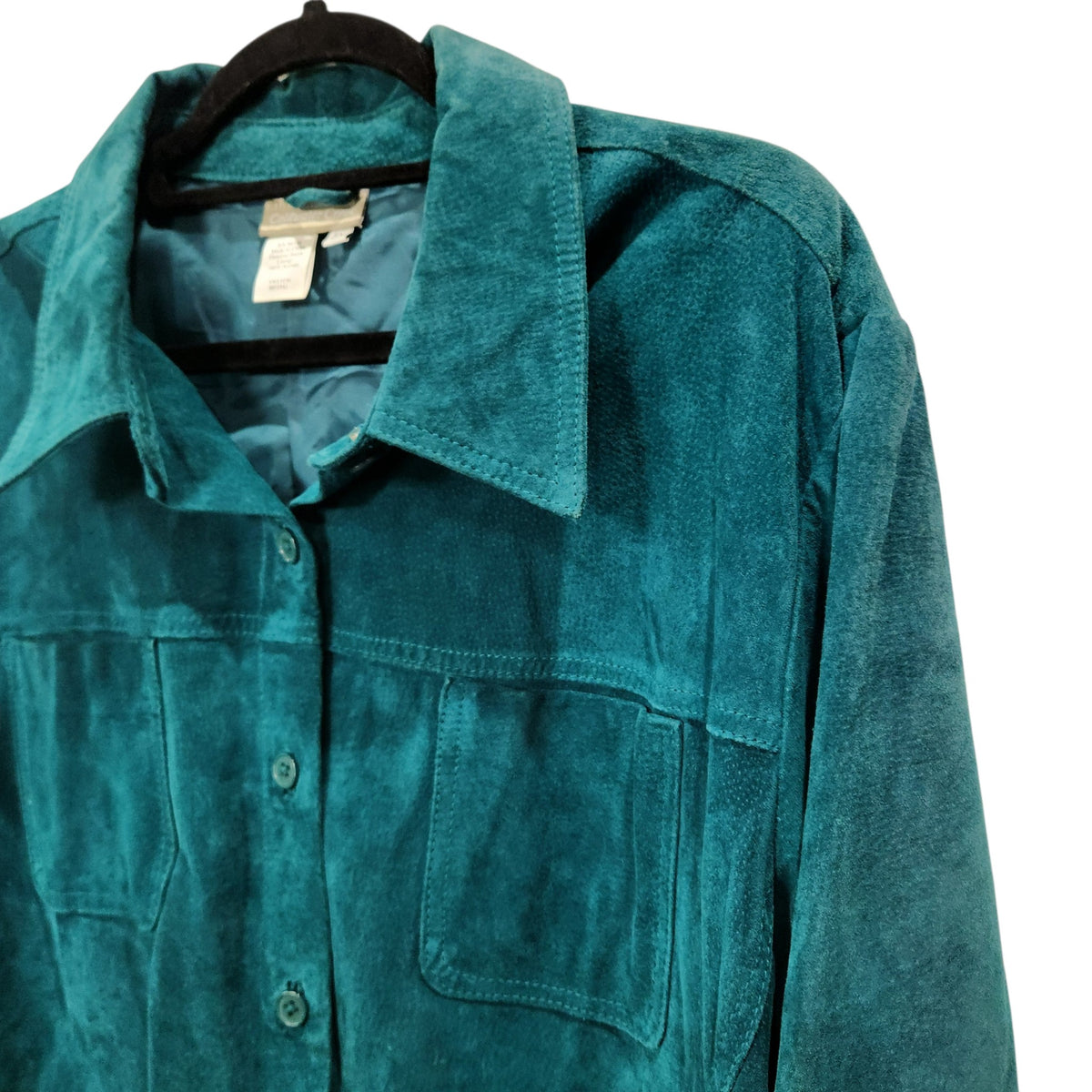 Lucille Golden Vintage, LLC teal genuine suede button-front jacket with a classic collar and chest pockets.