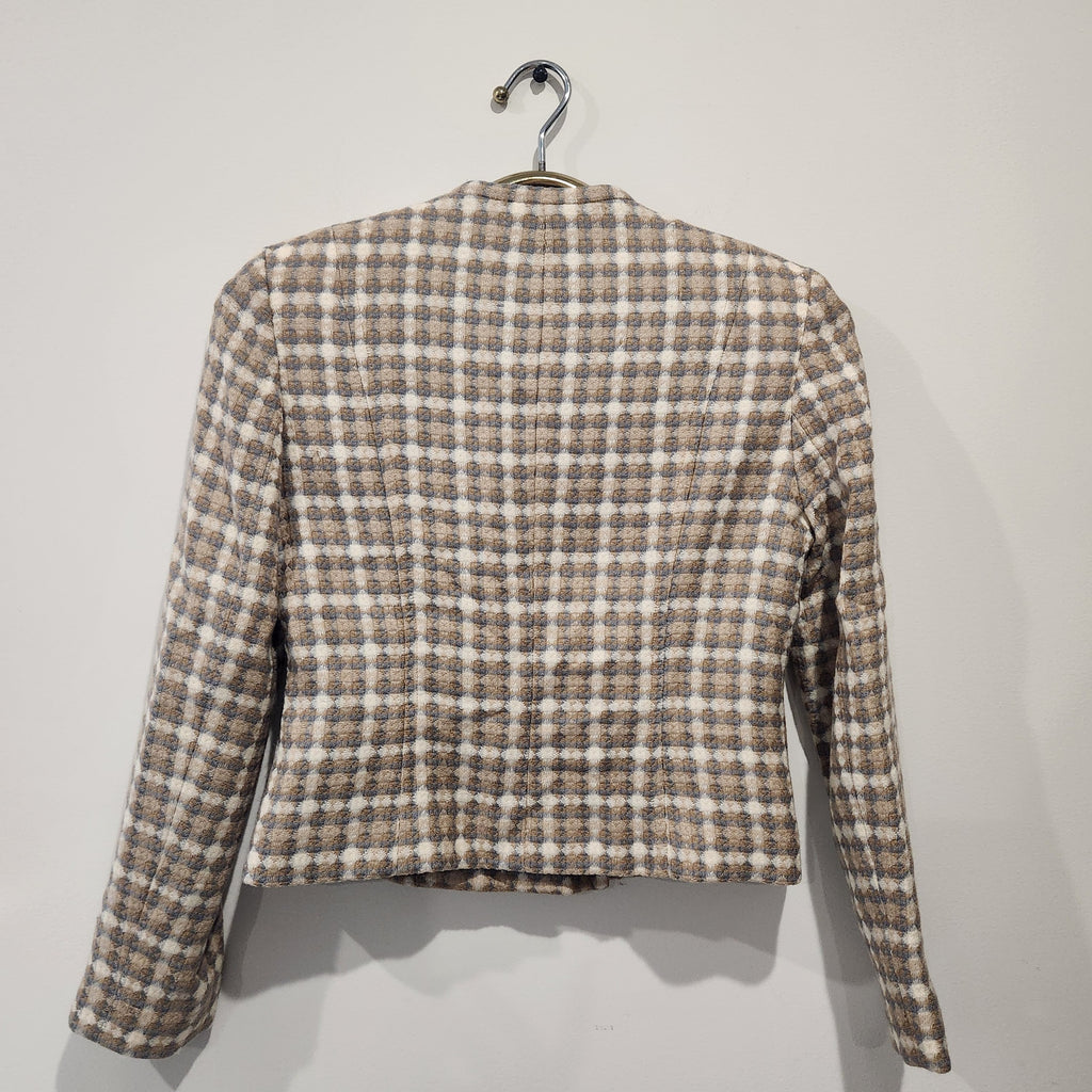 Back view of a Lucille Golden Vintage, LLC textured check blazer in beige, cream, and grey with a collarless design.