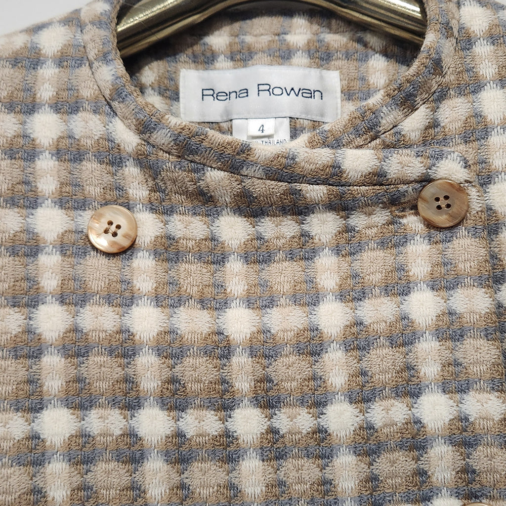 Lucille Golden Vintage, LLC Rena Rowan collarless double-breasted blazer in a beige, cream, and grey textured check.