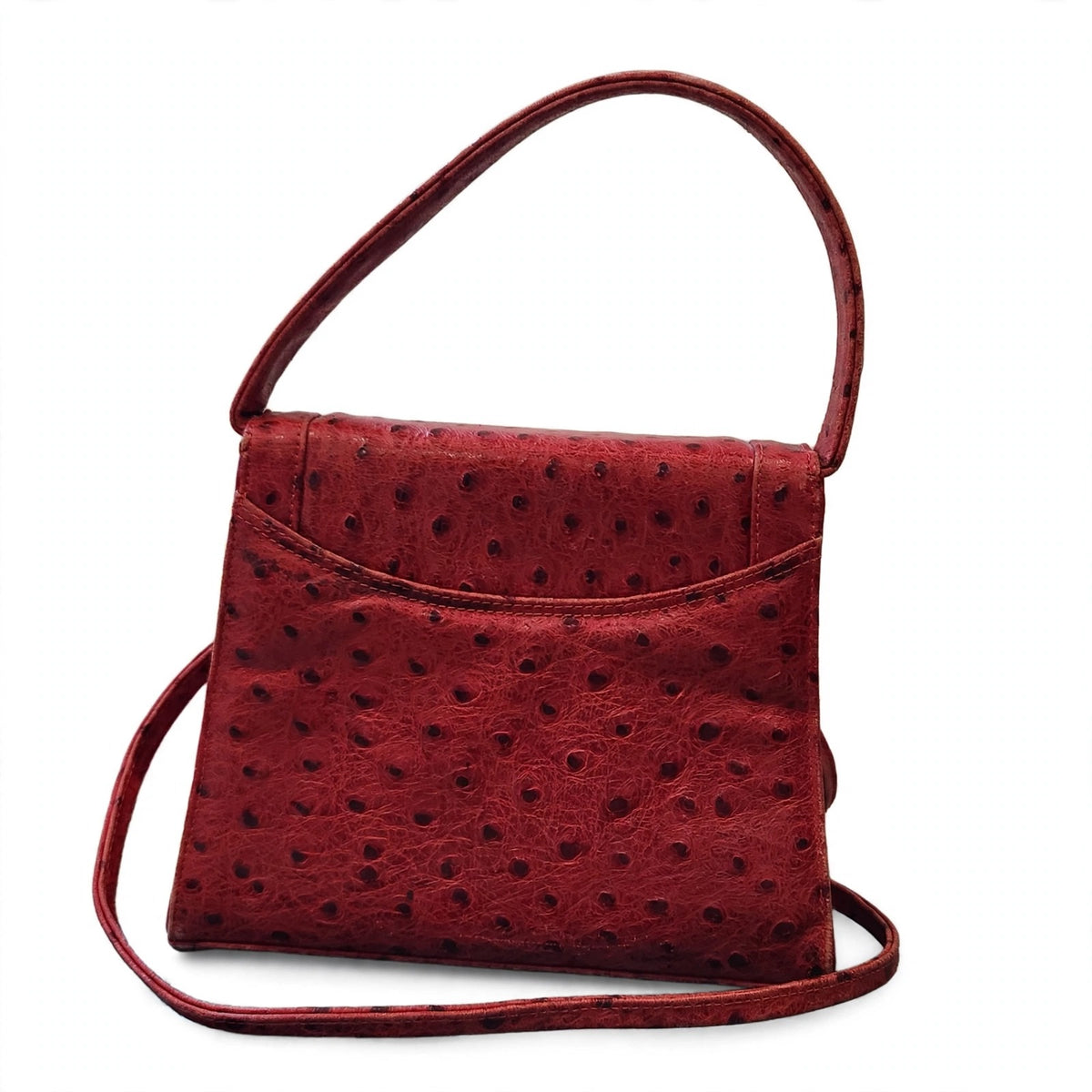Back view of vintage Mike's Collection red ostrich-embossed leather mini handbag on a white background, showing the exterior slip pocket