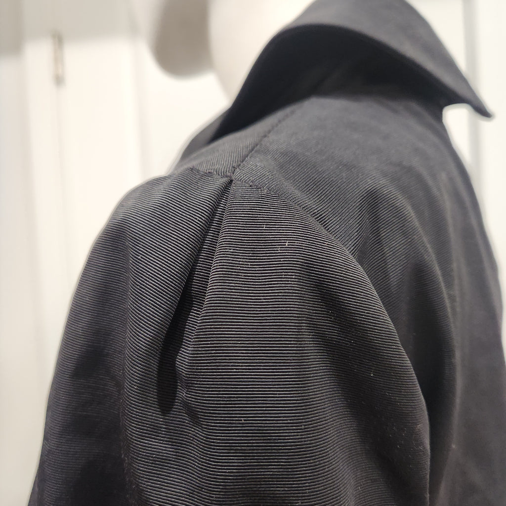 Vintage Holiday In Italy | Black Italian Trench Coat
Made in Italy • Luxury Outerwear Size 42