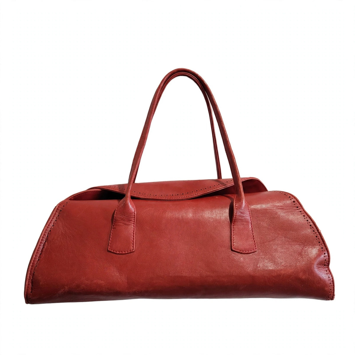 Front view of vintage Robinson Valentine brick-red leather barrel shoulder bag with shoulder straps raised, on a white background